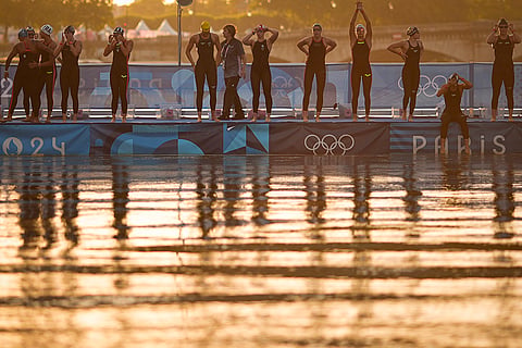 Athletes line up for the start of marathon swimming women's 10km competition